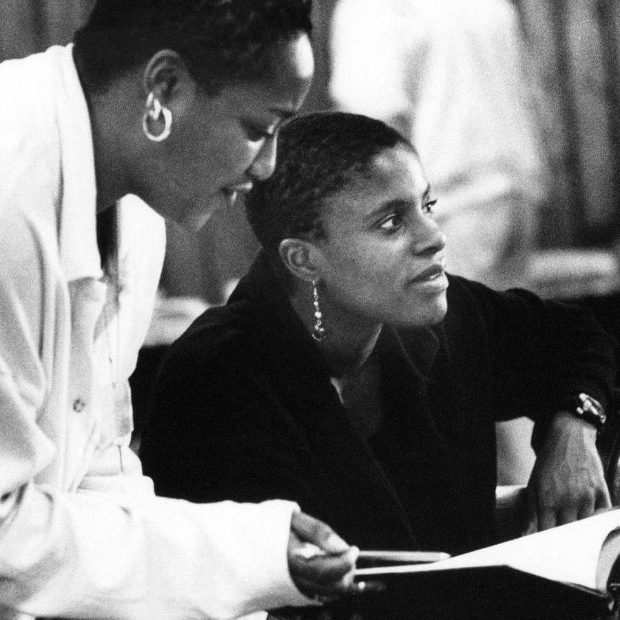 95-Leave-Taking-Richard-H-Smith-aspect-ratio-2000-1000 The writer Winsome Pinnock during rehearsals for her play, Leave Taking, in 1995 - holding a hot drink whilst someone points a pencil at a script