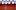 NT ARCHIVE AT 25-Posters Rows of poster tubes sitting on top of red archive drawers labelled 'Olivier' and 'Lyttelton Posters'
